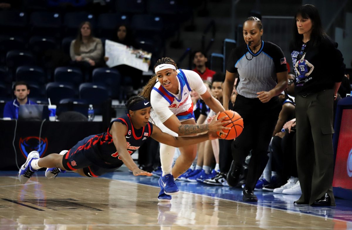 Taylor Johnson-Matthews takes the ball from Jayda Brown on Sunday, March 2, 2025, at Wintrust Arena during the second half. DePaul averages 6.8 steals per game.