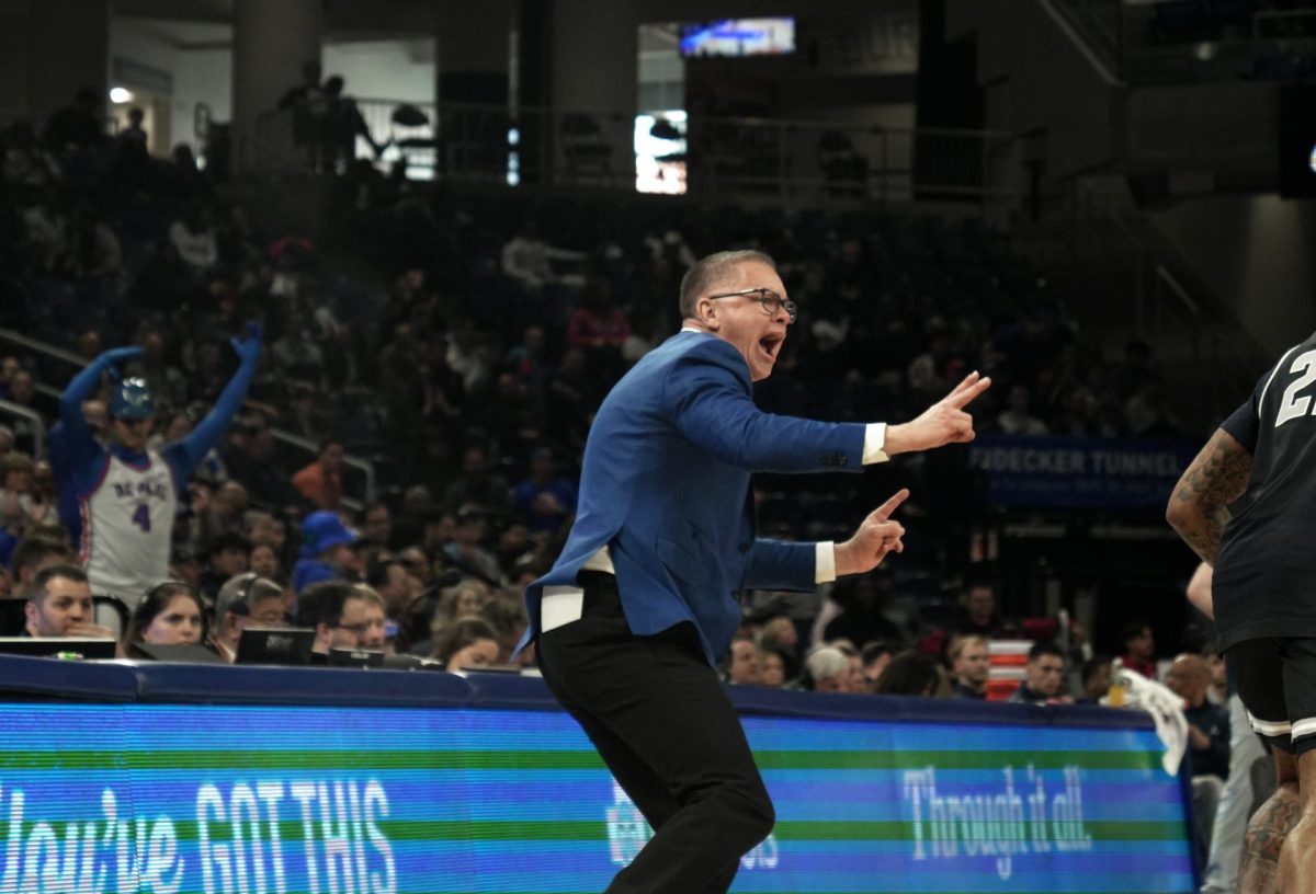 Chris Holtmann yells along the sidelines during the second half on Saturday, March 8, 2025, at Wintrust Arena. Both of their previous wins came against Big East opponents.