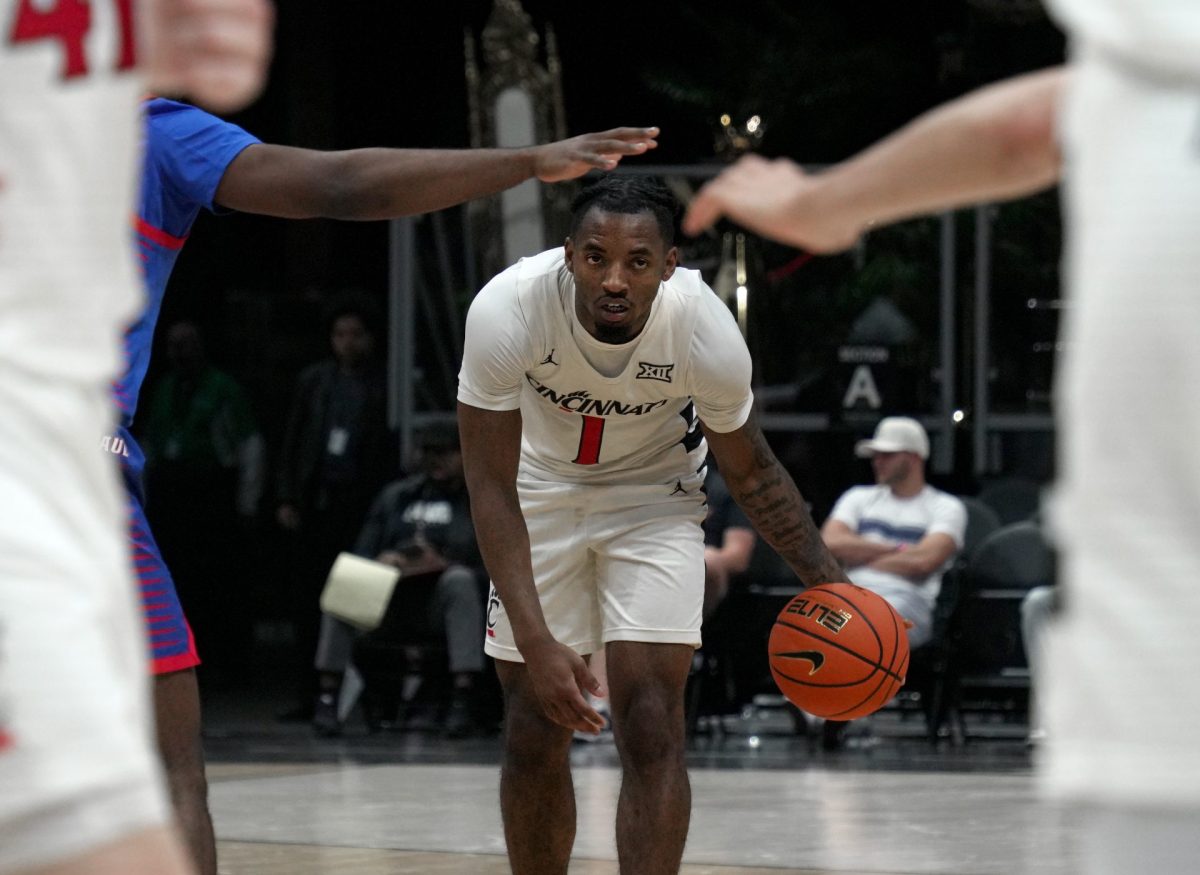 Day Day Thomas plans his next move while dribbling on Tuesday, April 1, 2025, at MGM Grand Garden Arena. Cincinnati had six players score in double figures.