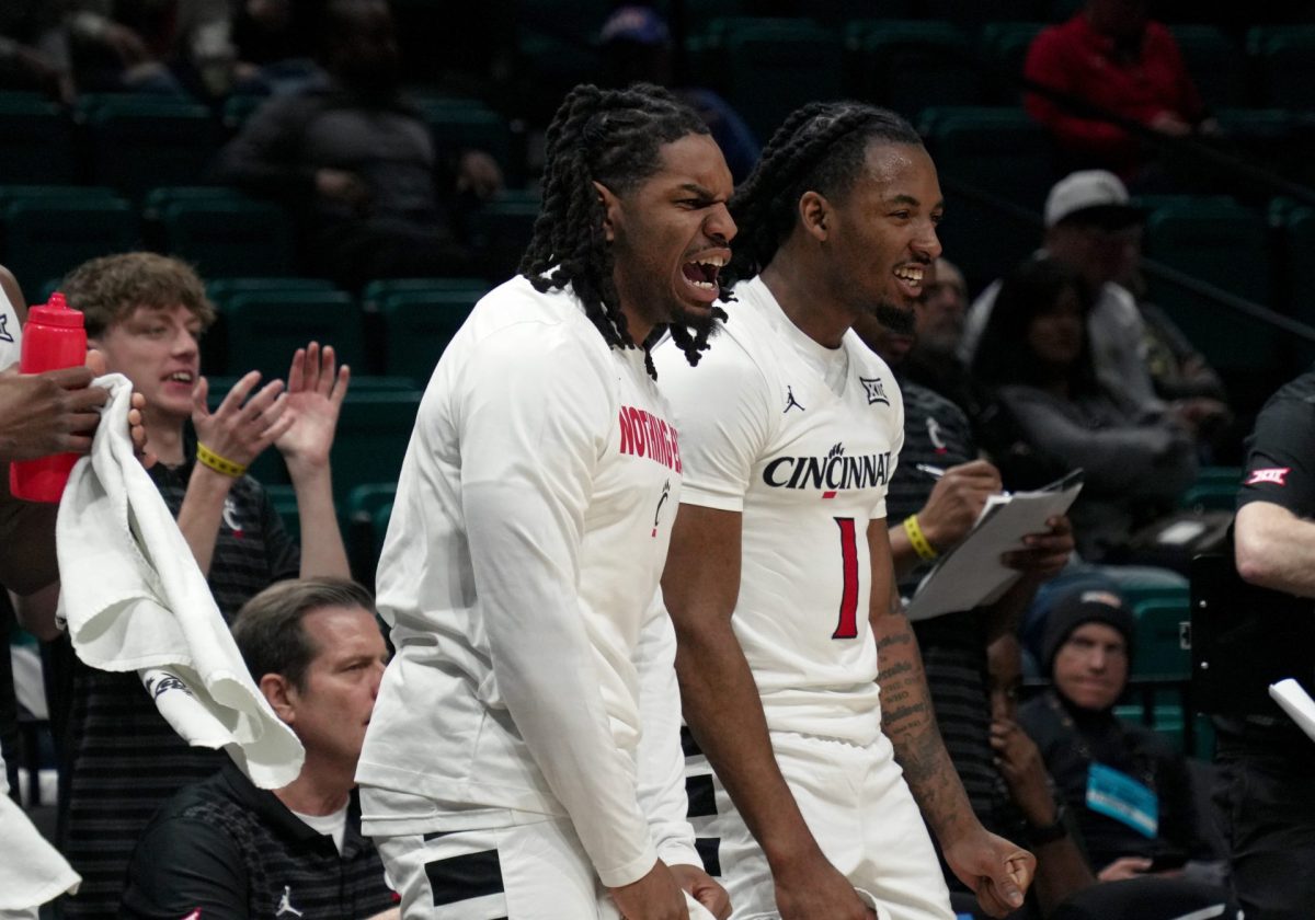 Cincinnati celebrates their win from the bench on Tuesday, April 1, 2025, at MGM Grand Garden Arena. The final score of the game was 61-83, with DePaul losing and heading back to Chicago. 