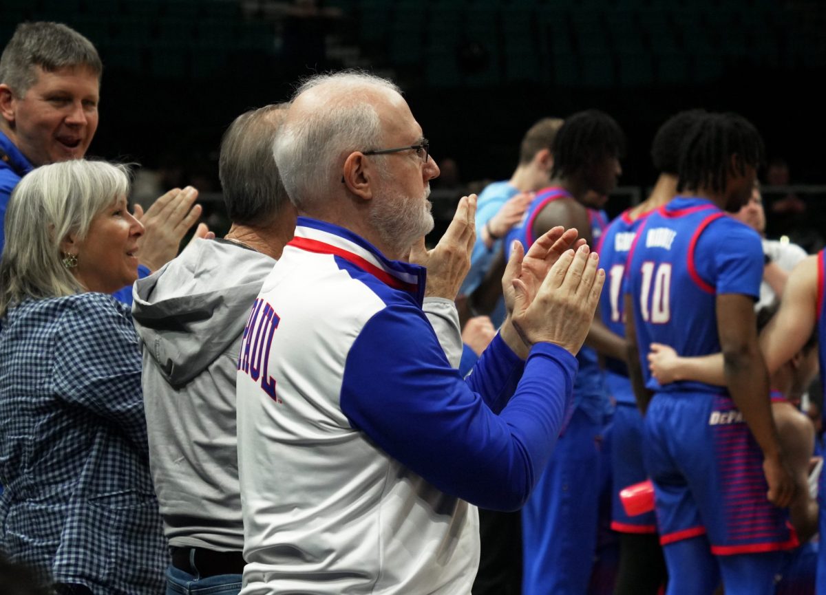 A DePaul fan cheers in the stands during the first half on Tuesday, April 1, 2025, at MGM Grand Garden Arena. Prior to the Crown tournament, DePaul has won three of their last five games.