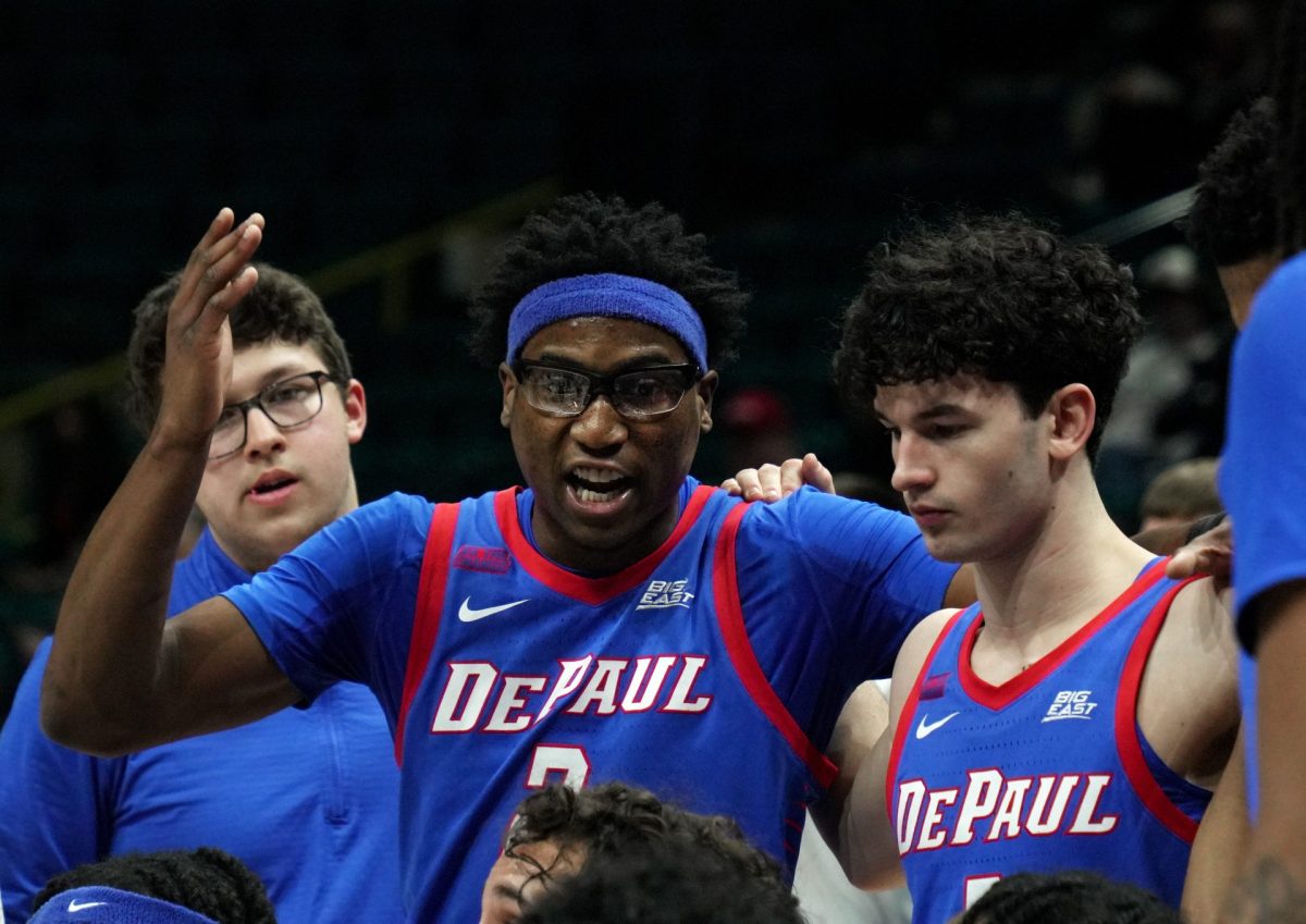 Layden Blocker shouts during a timeout during the first half on Tuesday, April 1, 2025, at MGM Grand Garden Arena. DePaul fell behind Cincinnati at half-time, with a score of 33-23.