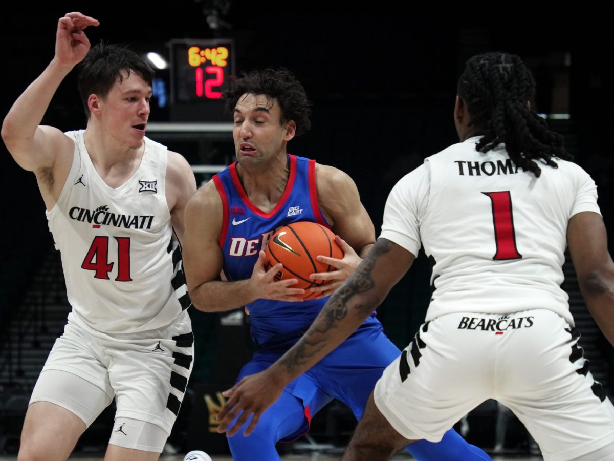 Isaiah Rivera fights for possession while Simas Lukošius, left, and Day Day Thomas block on Tuesday, April 1, 2025, at MGM Grand Garden Arena. Rivera made two straight three-pointers early in the second half. 