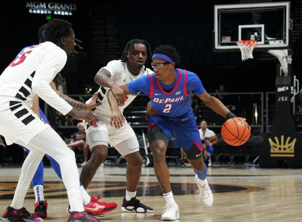 Layden Blocker dribbles around Cincinnati during the Crown tournament on Tuesday, April 1, 2025, at MGM Grand Garden Arena in Las Vegas. 