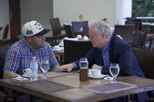 In this photo released by Senator Van Hollen's press office, Hollen, right, speaks with Kilmar Abrego Garcia, a Salvadoran citizen who was living in Maryland and deported to El Salvador by the Trump administration, in a hotel restaurant in San Salvador, El Salvador, Thursday, April 17, 2025. 