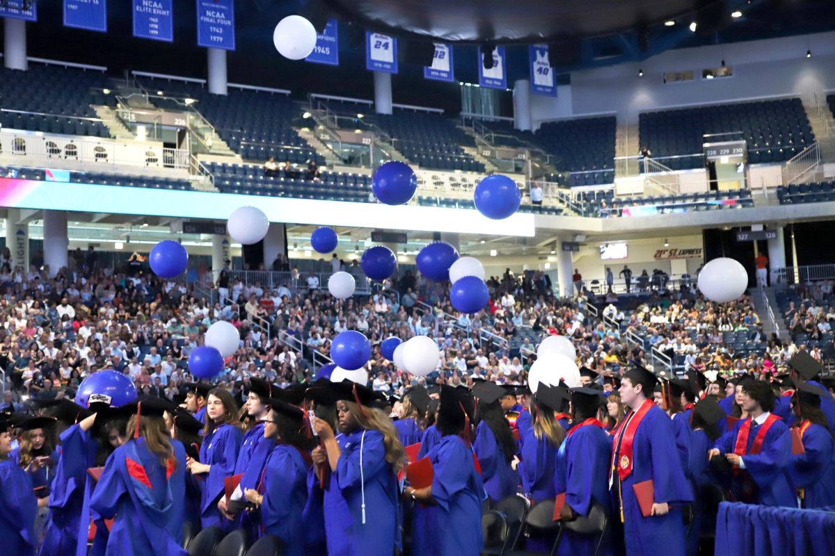 DePaul students celebrate their graduation at Wintrust Arena on Saturday, June 15, 2025. As graduation nears, many DePaul seniors say that their experience going to school in the heart of Chicago has made the leap into post-grad life feel less intimidating.