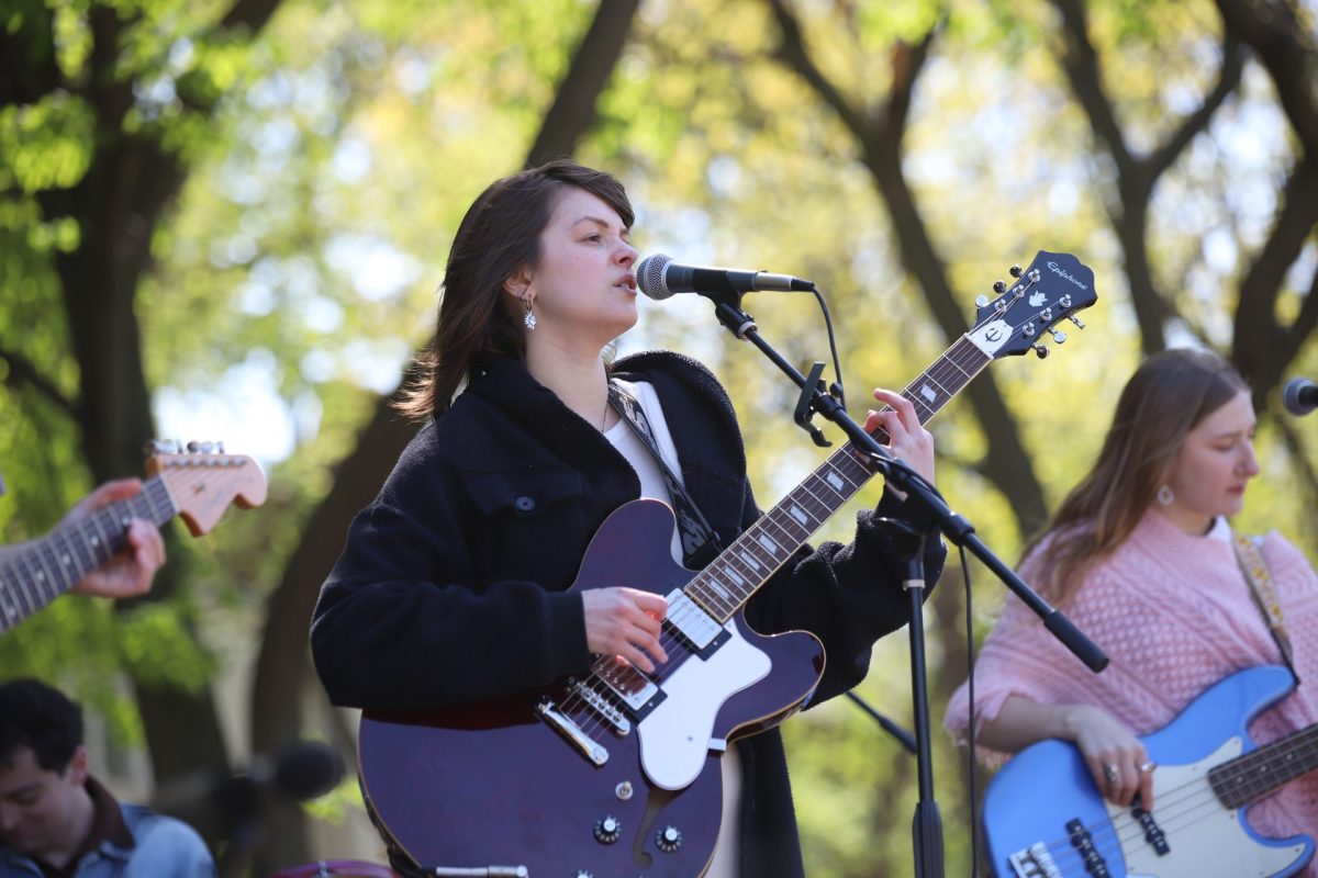 Aly Wojtowicz, guitarist and vocalist of Lace for Leisure, performs “Sylvie” for Grantslam in Jonquil Park on Saturday, May 10, 2025. Hundreds attended the event.