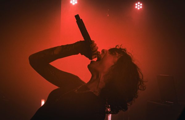 Jane Remover screams into the mic at their show at Lincoln Hall on Friday, April 25, 2025. Rapper and DJ d0llywood1 opened for Jane, then moving into operating a DJ kit for Jane when they took center stage.
