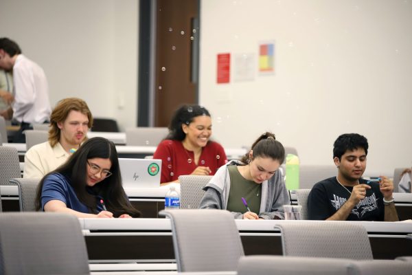 SGA member Isabella Simkus works with her fellow members at the general body meeting on Wednesday, May 14, 2025. SGA continues to work on initiatives for upcoming fall quarter.