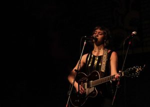 Violet Clare performs at Fallen Log in Chicago on Thursday, Feb 20. Clare said she tries to mix in covers and upbeat songs with her originals and more introspective music. At this show, she said a concertgoer singing along gave her a needed confidence boost.