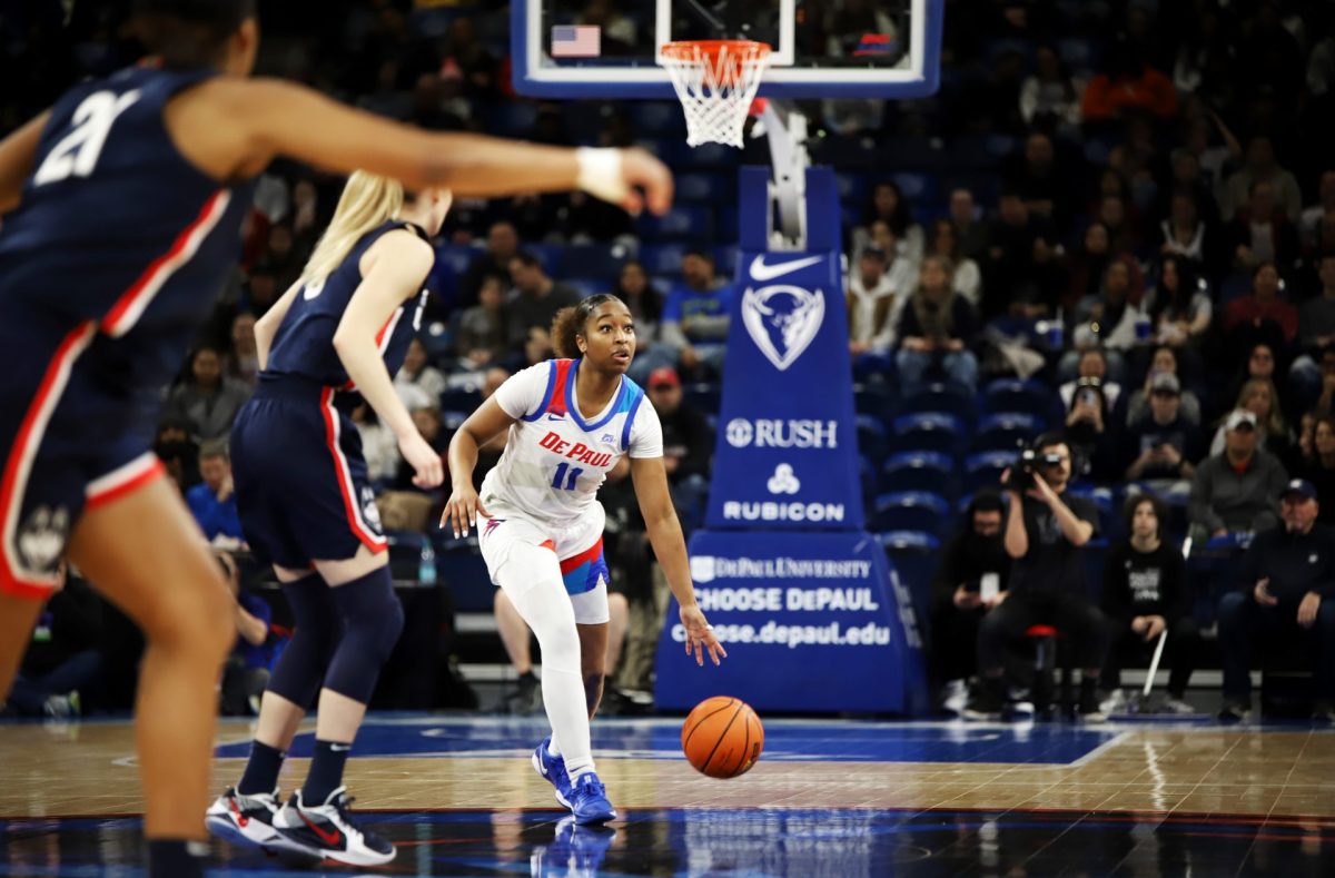 Sumer Lee dribbles down the court against UConn on Wednesday, Jan. 29, 2025, at Wintrust Arena. DePaul women's basketball finished the 2024-25 season with an overall record of 13-19.